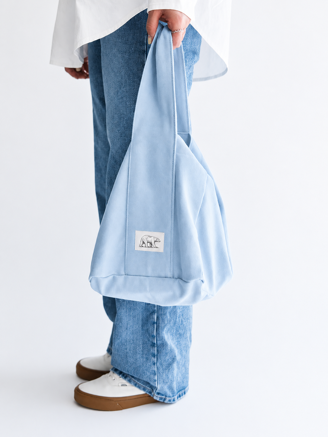 Pale blue Northern Water Co. fabric carry bag