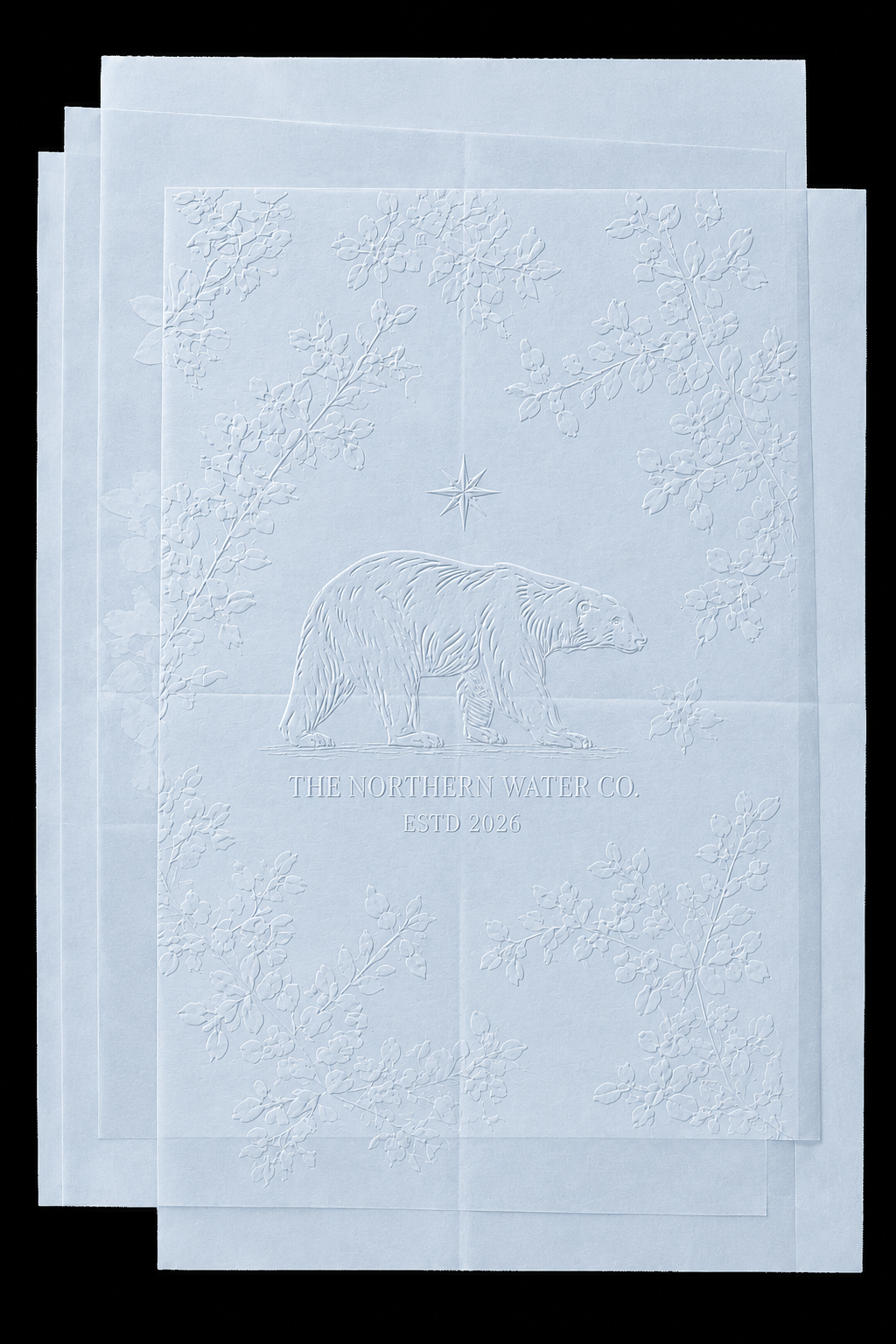 Embossed Northern Water Co. tissue paper with polar bear and botanicals